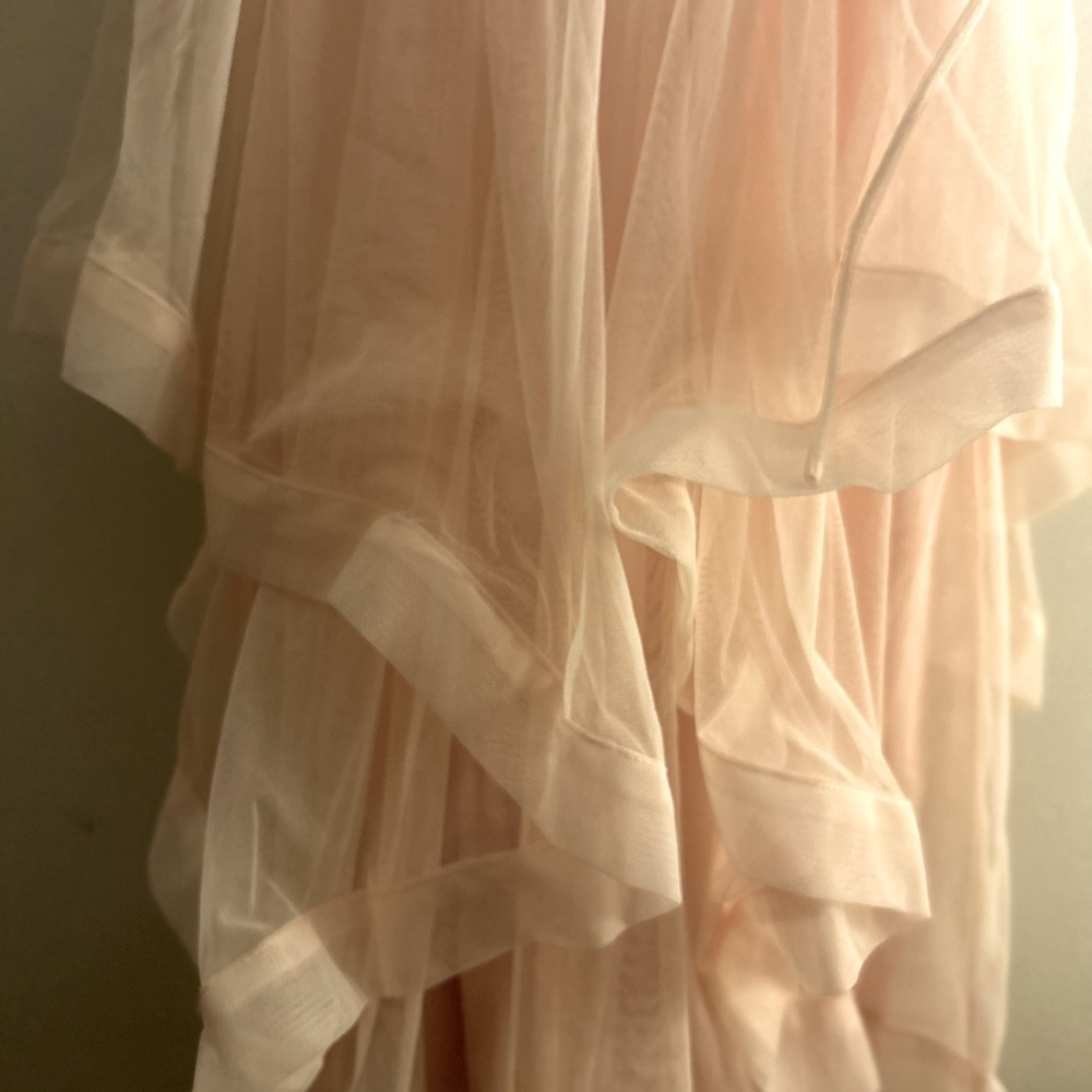 A pastel pink birthday dress.